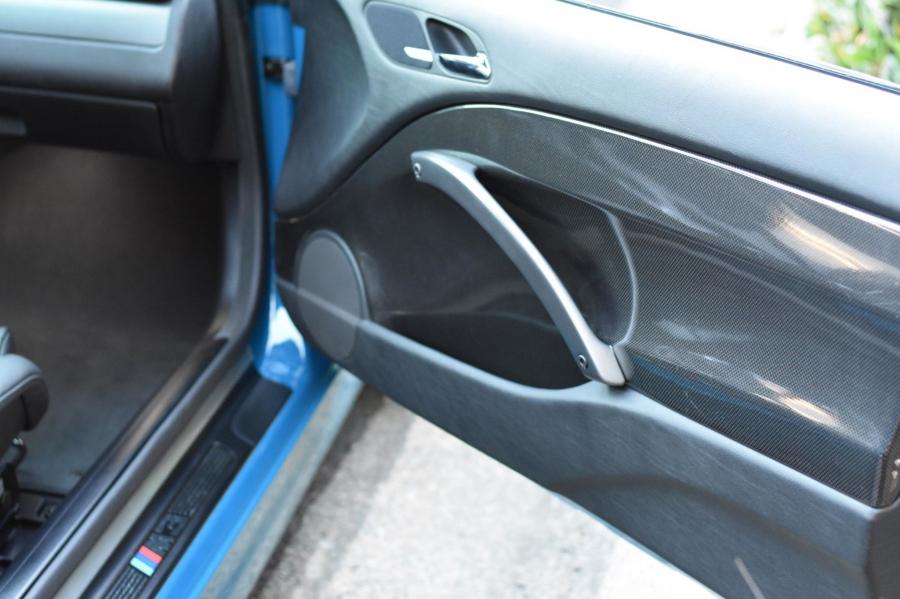 Детали интерьера BMW M3 Coupe Laguna Seca Blue (E46) 2003 года  (фото 119 из 149)